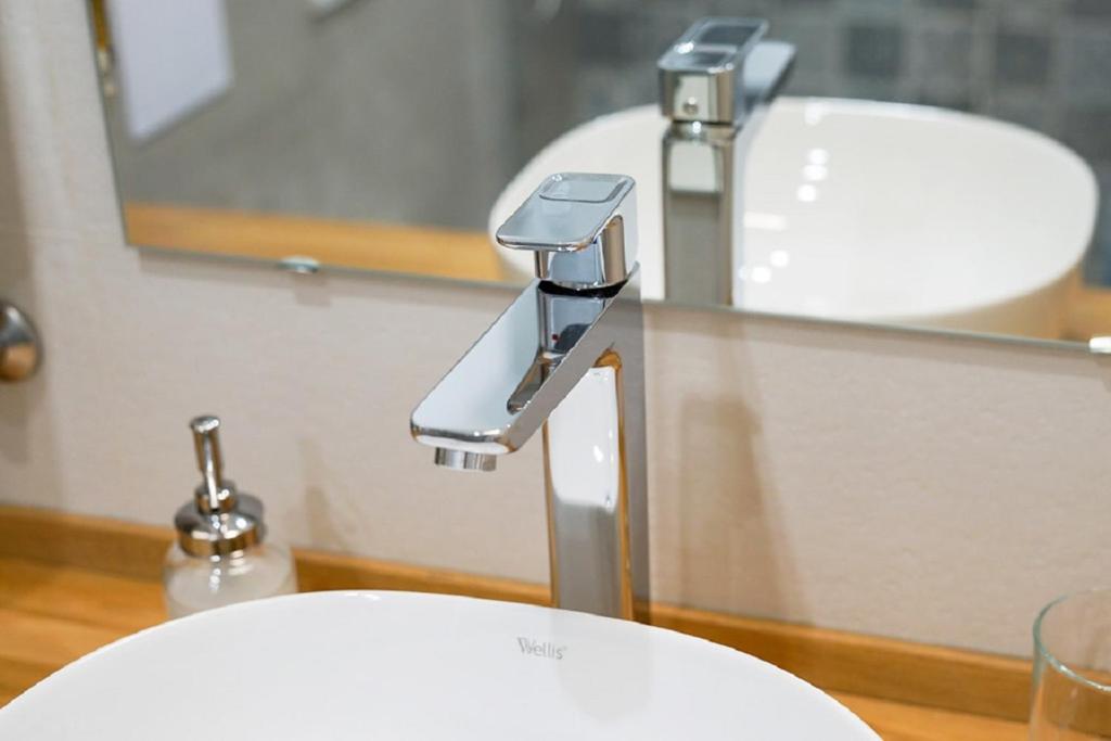 Koupelna v ubytování RÉS Apartman