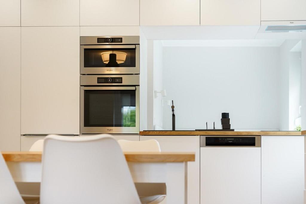 Kuchyň nebo kuchyňský kout v ubytování RÉS Apartman