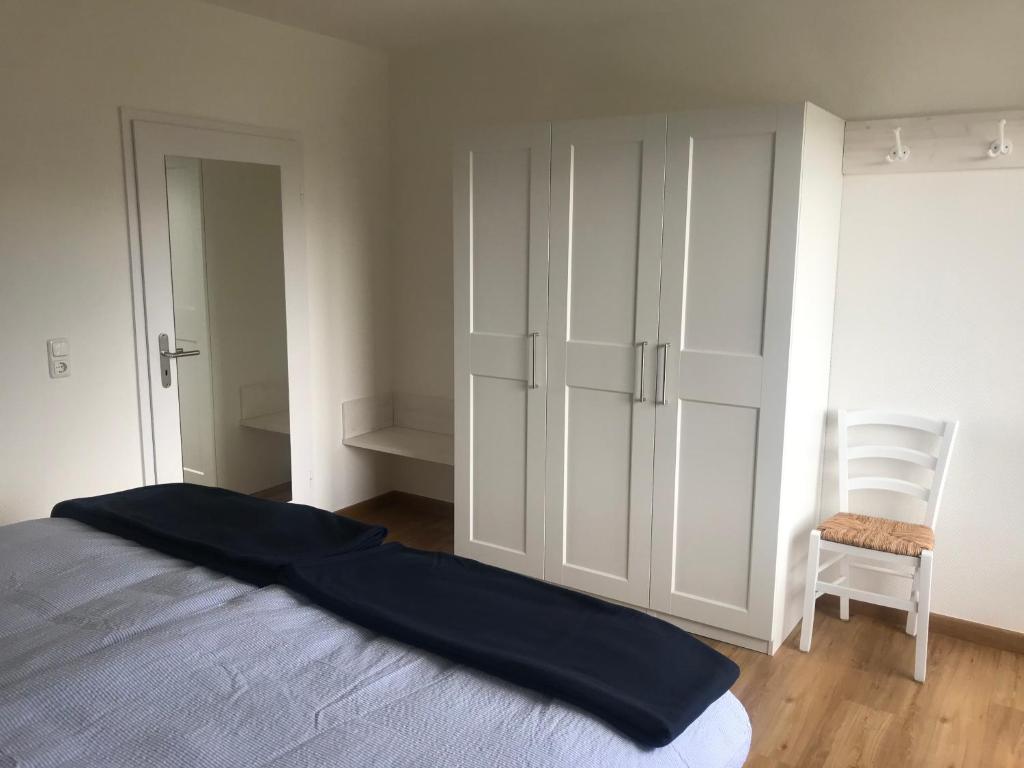 Ein Bett oder Betten in einem Zimmer der Unterkunft Moin !