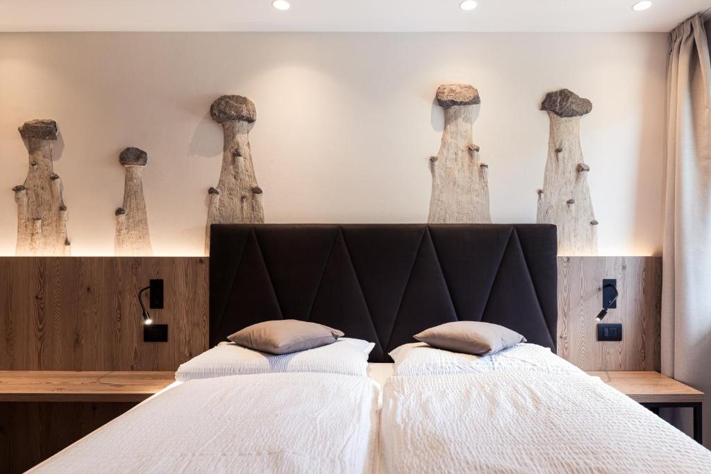 Postel nebo postele na pokoji v ubytování Hotel Berghang