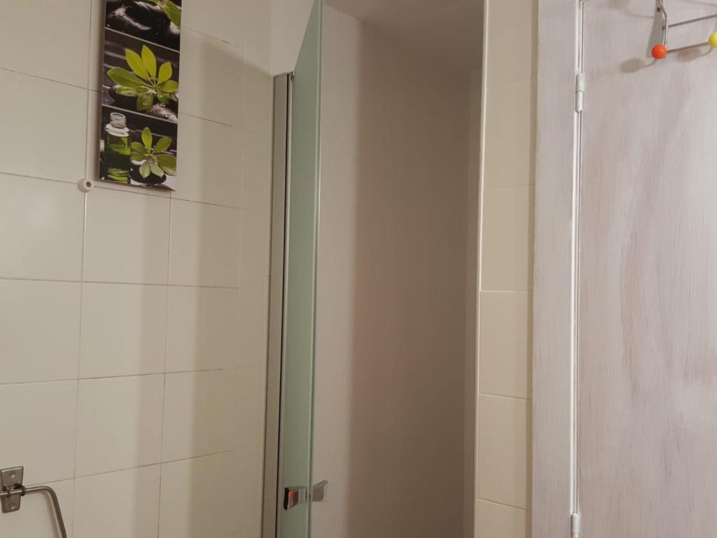 A bathroom at BRAVAHOLIDAYS-260-Lotus-2
