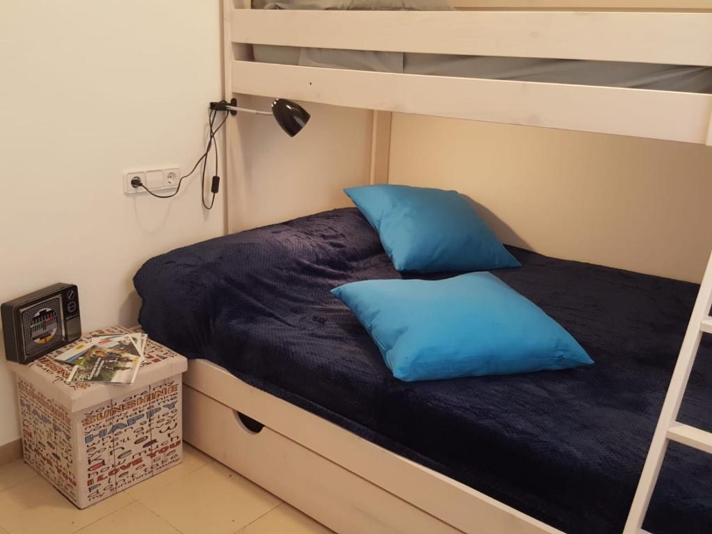 A bed or beds in a room at BRAVAHOLIDAYS-260-Lotus-2