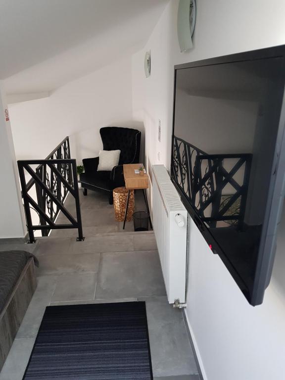 TV a/nebo společenská místnost v ubytování Central Luxury Apartments