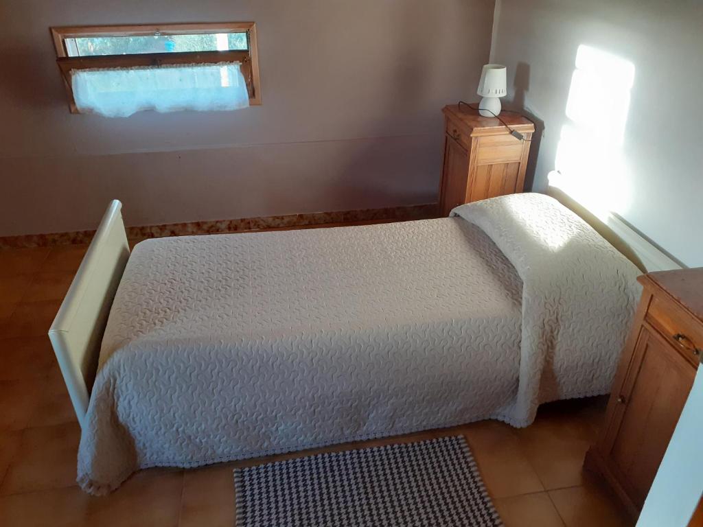 A bed or beds in a room at B & B Country House