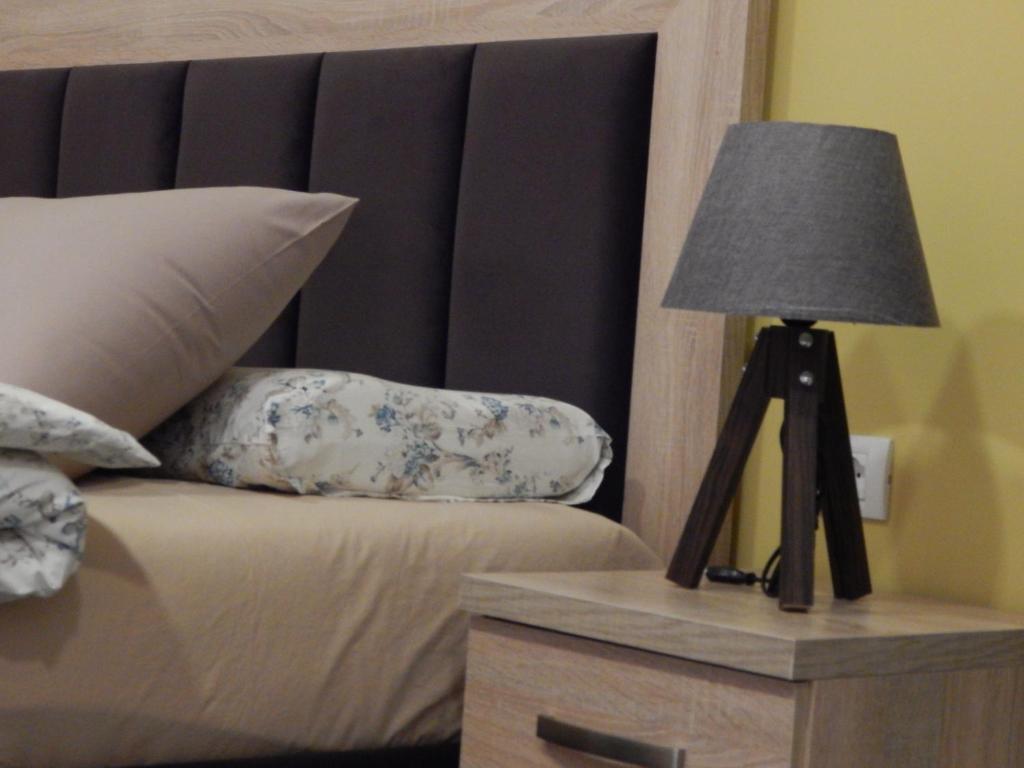 Postel nebo postele na pokoji v ubytování Ora Apartament