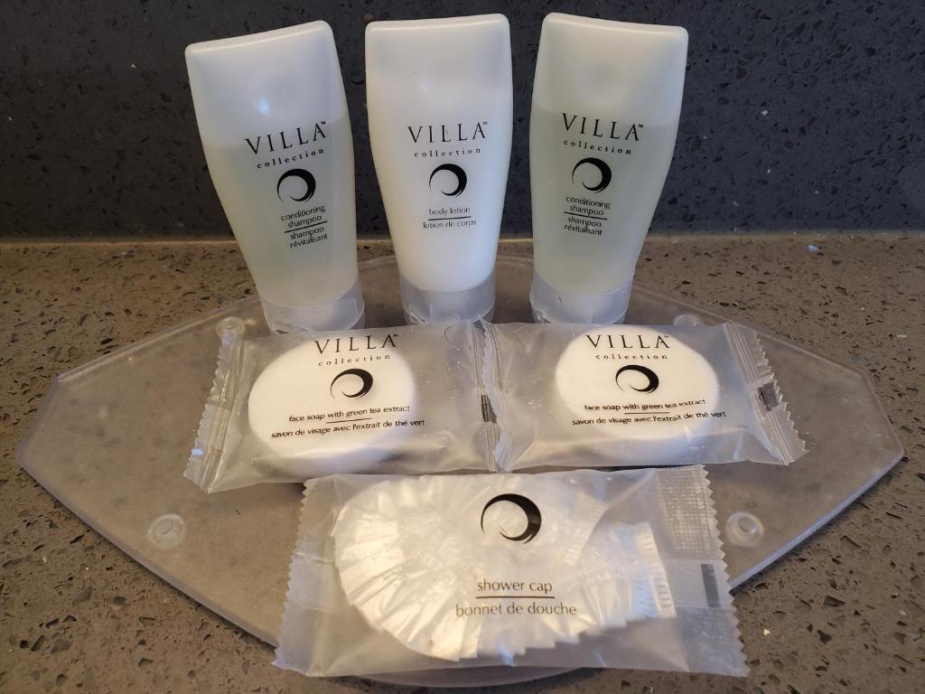 three bottles of wrath sunscreen on a tray at Alpine Inn Abbotsford in Abbotsford