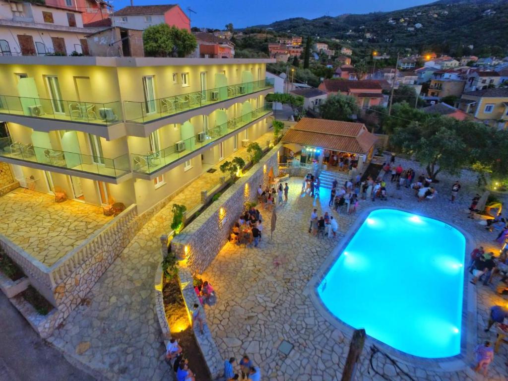 an overhead view of a building with a swimming pool at Aria Suites in Kassiopi