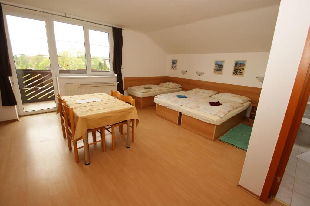 Postel nebo postele na pokoji v ubytování Vila Ema