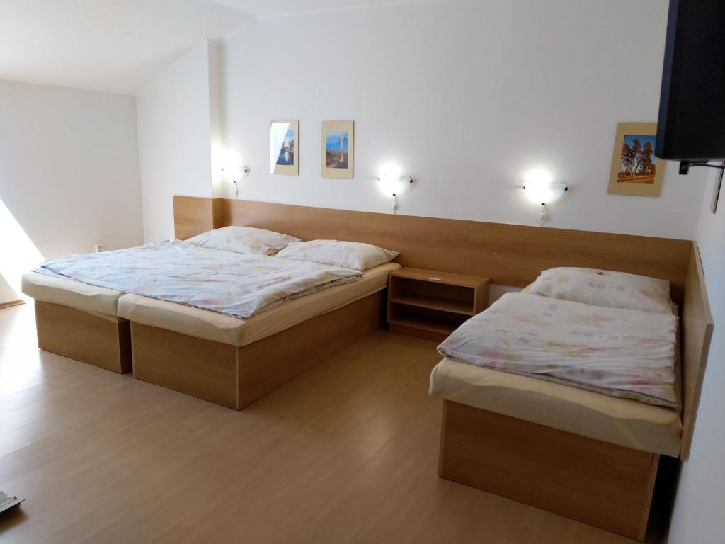Postel nebo postele na pokoji v ubytování Vila Ema