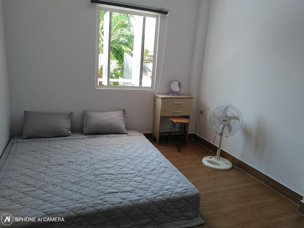 Giường trong phòng chung tại Mia House Homestay Phan Thiet