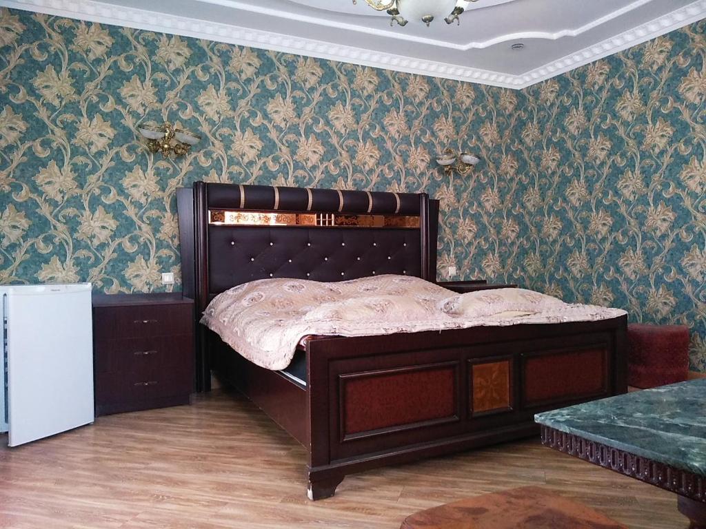Postel nebo postele na pokoji v ubytování Hotel Edemi Castle