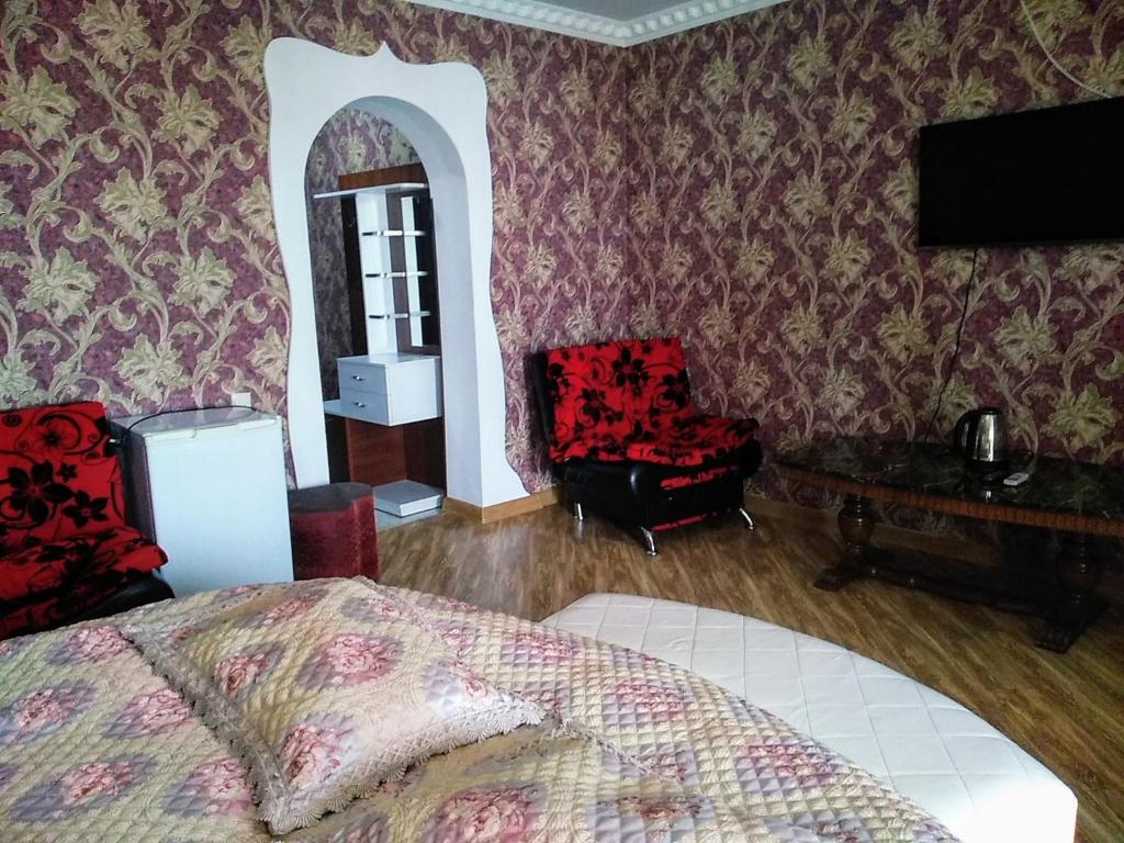 Postel nebo postele na pokoji v ubytování Hotel Edemi Castle
