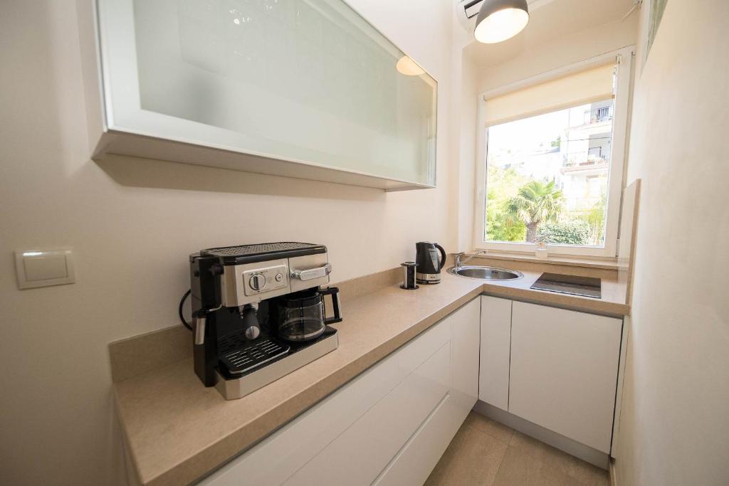 Kuchyňa alebo kuchynka v ubytovaní Apartmani Marion Crikvenica