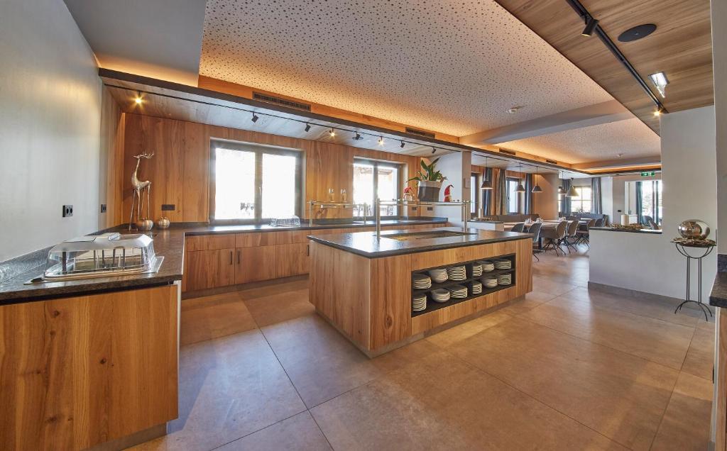 Kuchyň nebo kuchyňský kout v ubytování Hotel Gungau