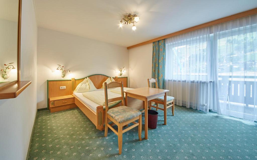 Postel nebo postele na pokoji v ubytování Hotel Gungau