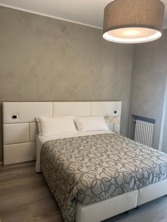 Postel nebo postele na pokoji v ubytování Hotel Conca D'Oro ***S