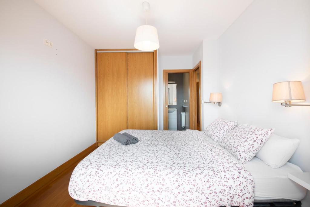 Postel nebo postele na pokoji v ubytování Modern Apartment with Spacious Terrace