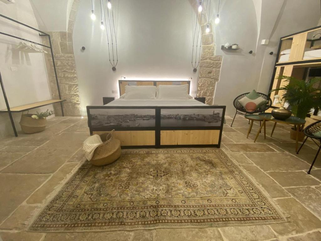 Postel nebo postele na pokoji v ubytování BORGOBELTRANI