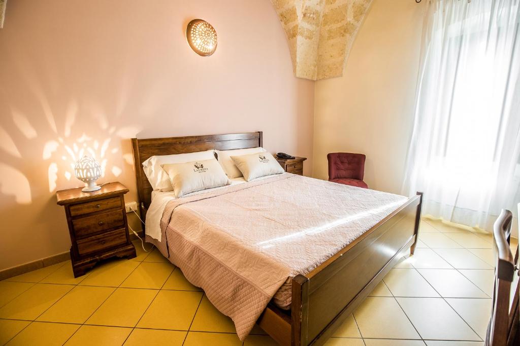 Postel nebo postele na pokoji v ubytování Laurito Resort & Spa