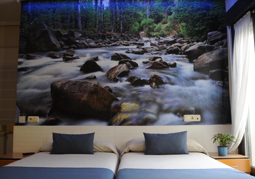 Postel nebo postele na pokoji v ubytování Hotel Aitana