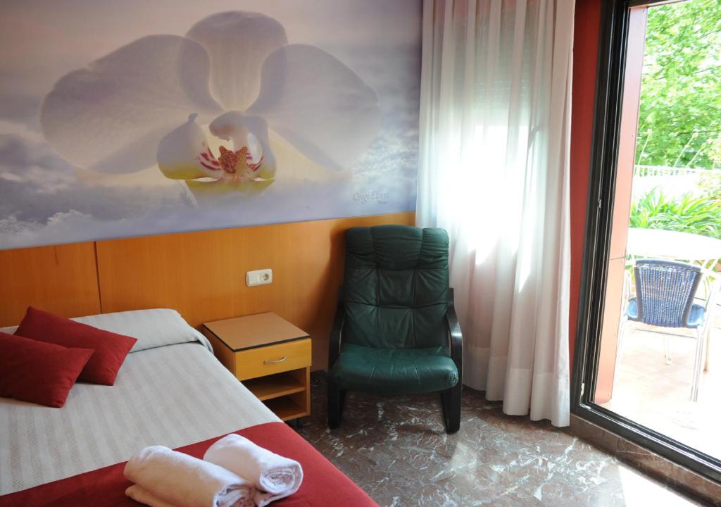 Postel nebo postele na pokoji v ubytování Hotel Aitana