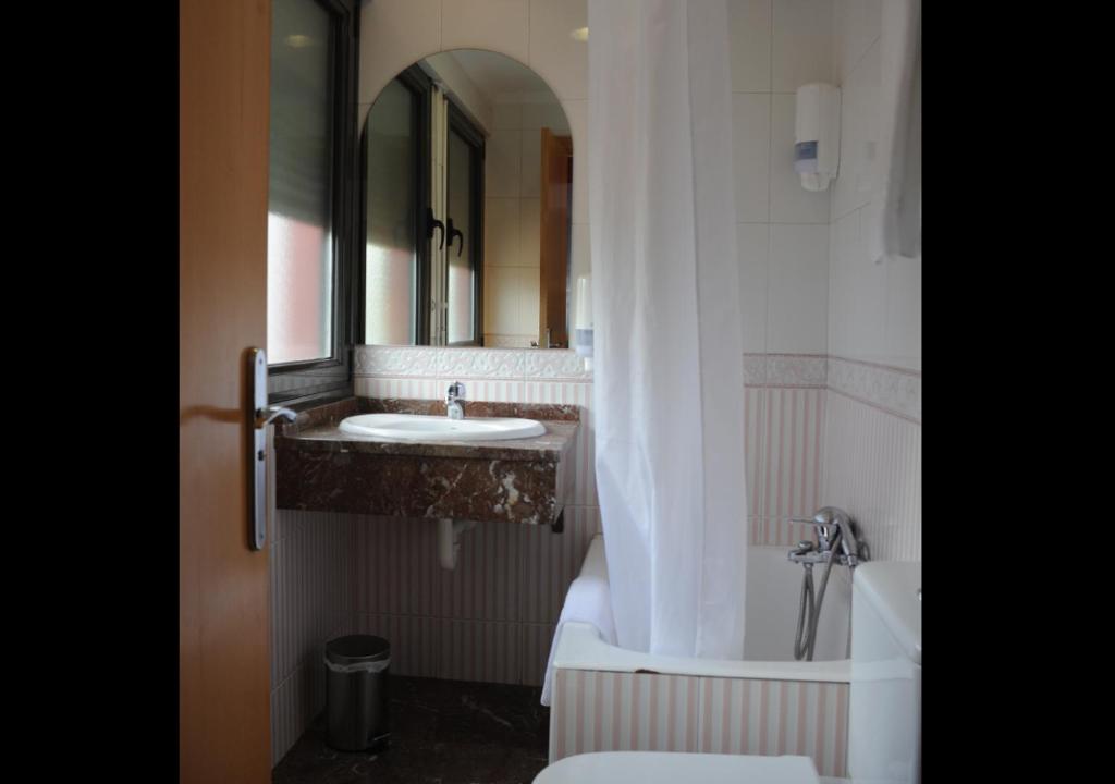 Koupelna v ubytování Hotel Aitana