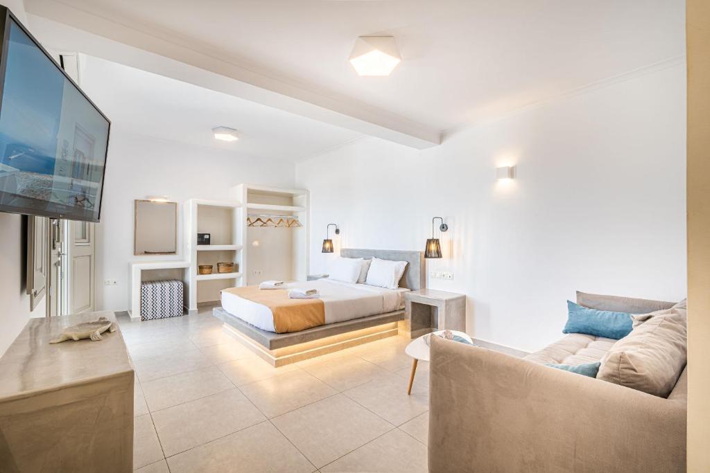 Postel nebo postele na pokoji v ubytování Caldera Stories private suites