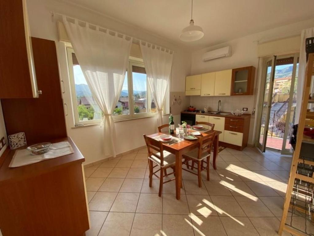 Kuchyň nebo kuchyňský kout v ubytování Appartamento Villa Circe