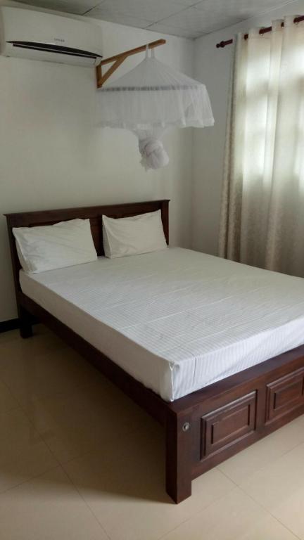 Postel nebo postele na pokoji v ubytování Umaya Holiday Home