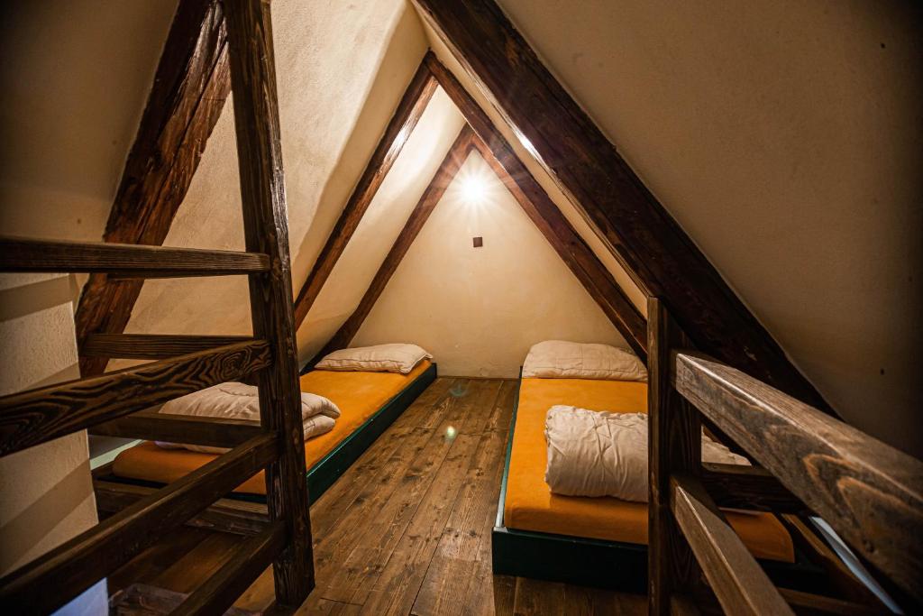 Postel nebo postele na pokoji v ubytování Hostel 99