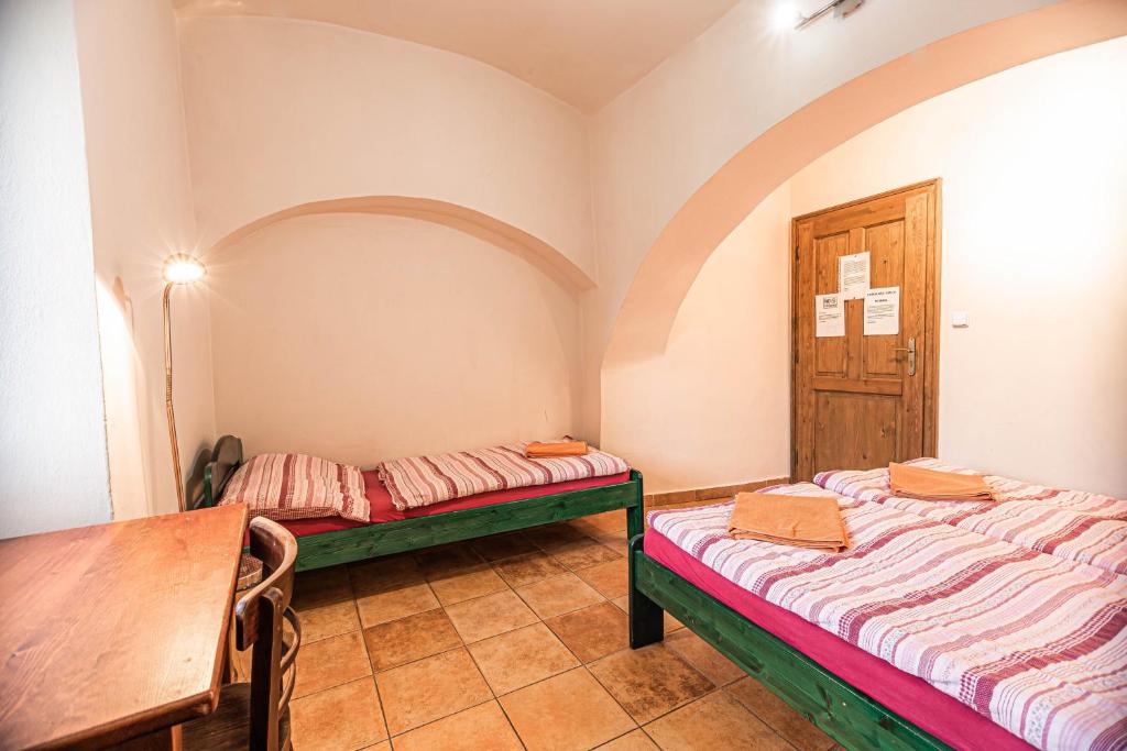 Postel nebo postele na pokoji v ubytování Hostel 99