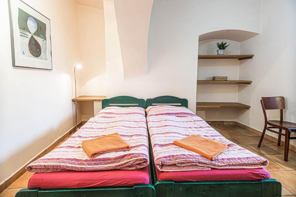 Postel nebo postele na pokoji v ubytování Hostel 99