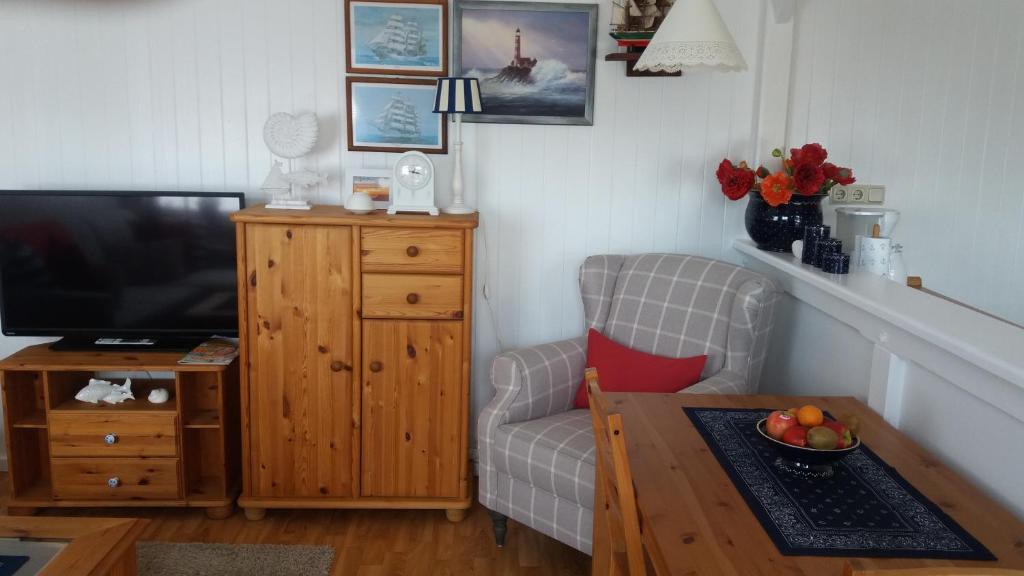 TV a/nebo společenská místnost v ubytování Ferienwohnung Insel Rügen