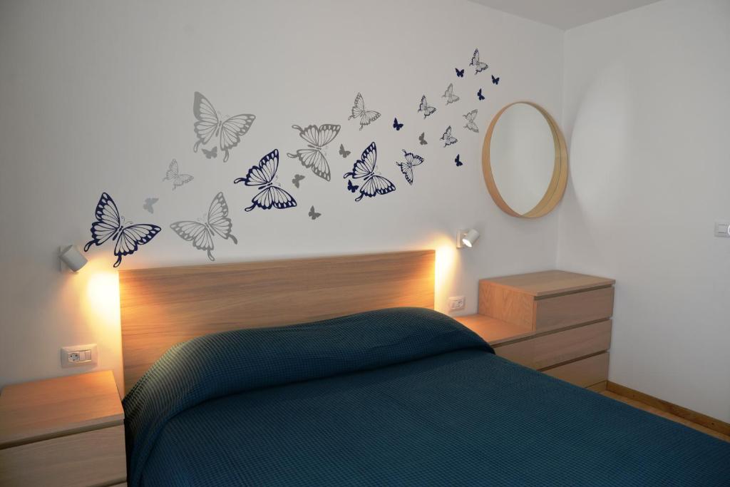 Postel nebo postele na pokoji v ubytování Apartments Palma & Pino