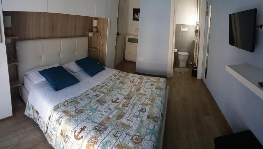 Postel nebo postele na pokoji v ubytování B&B Un posto al Sole