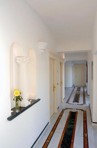 Postel nebo postele na pokoji v ubytování Hotel Bussola