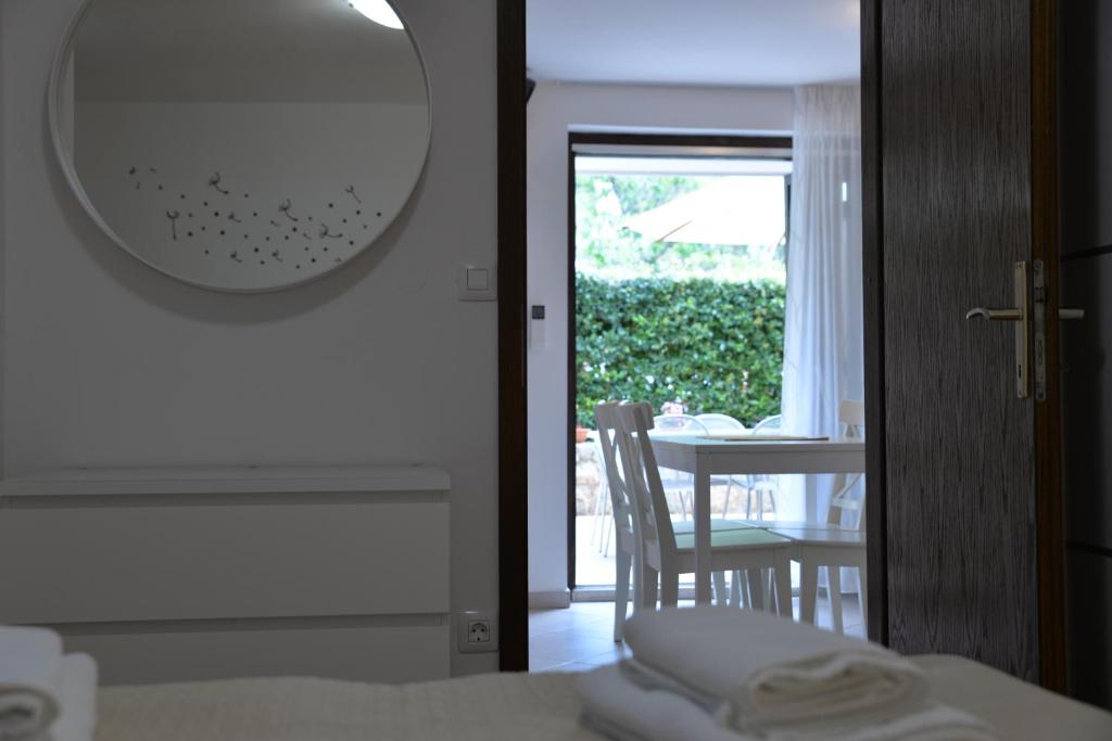 Postel nebo postele na pokoji v ubytování Apartments Palma & Pino