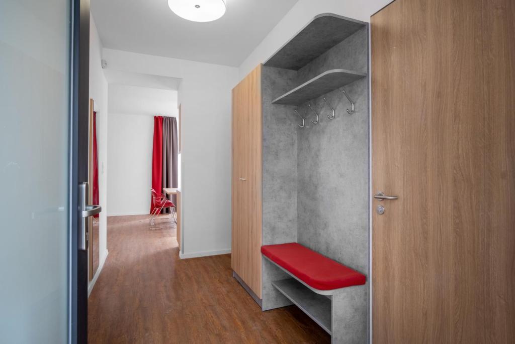 Postel nebo postele na pokoji v ubytování Szent Bernadett Családi Apartmanház