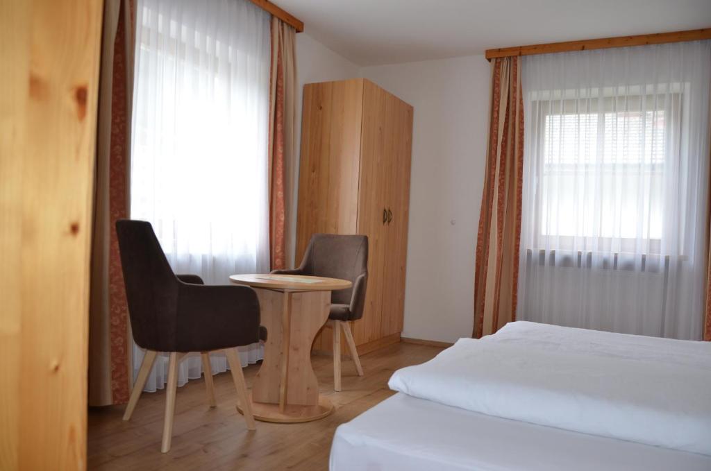 Postel nebo postele na pokoji v ubytování Haus Wally