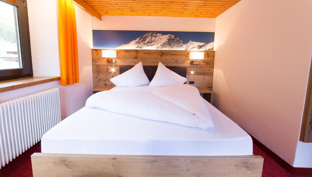 Postel nebo postele na pokoji v ubytování Pichlerhof