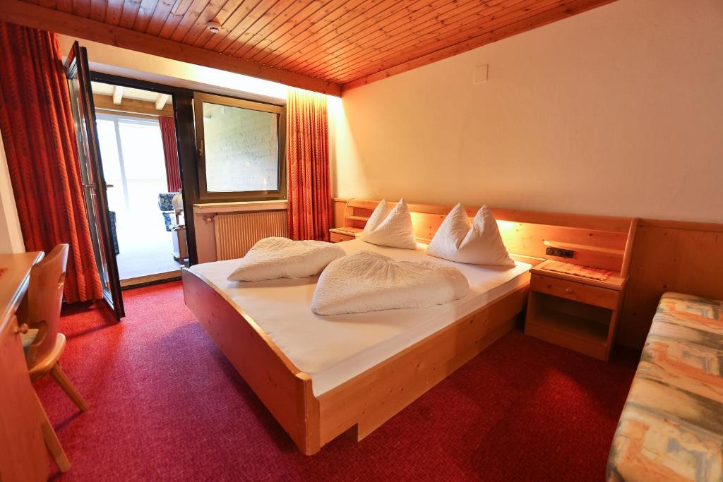 Postel nebo postele na pokoji v ubytování Pichlerhof
