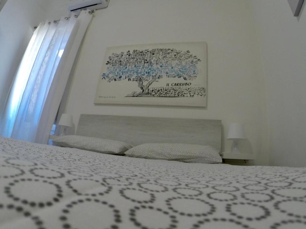 Posteľ alebo postele v izbe v ubytovaní A casa di Chiara