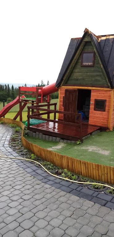 Herní místnost nebo prostor pro děti v ubytování GÓRALOWE domki & SPA