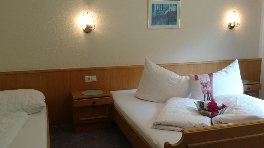 Postel nebo postele na pokoji v ubytování Haus Bergfreund