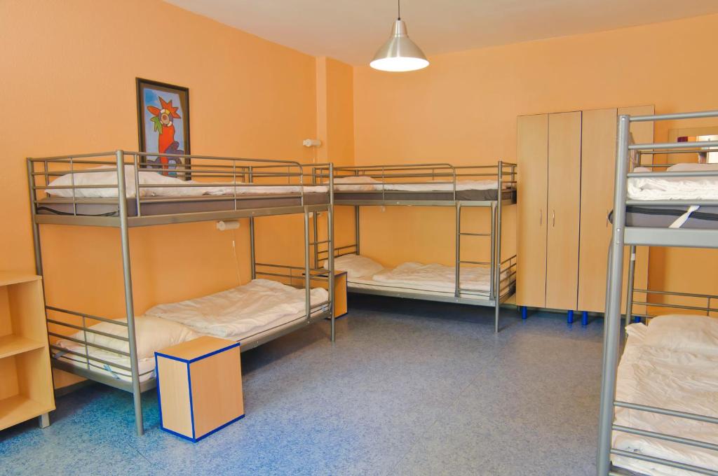 Postel nebo postele na pokoji v ubytování Happy Hotel Berlin
