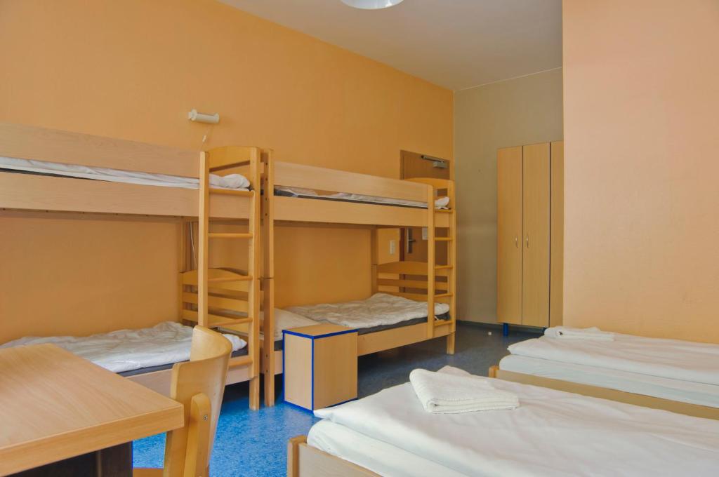 Postel nebo postele na pokoji v ubytování Happy Hotel Berlin