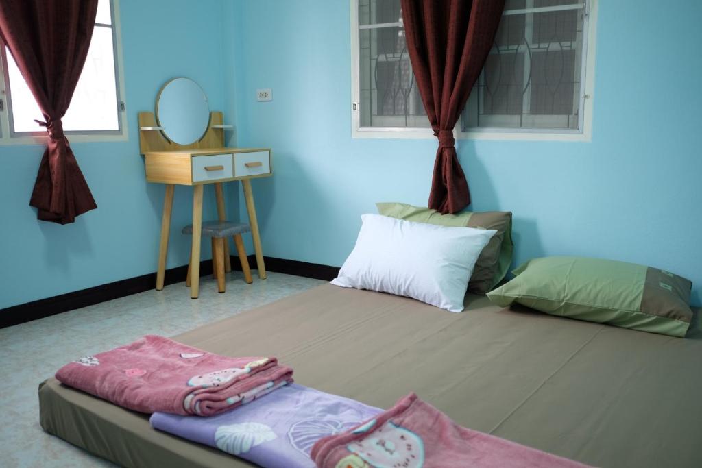 Postel nebo postele na pokoji v ubytování Little B house