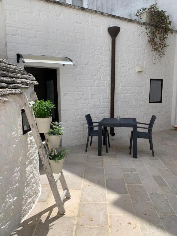 A patio or other outdoor area at Trulli Family - Trulli&Cummerse