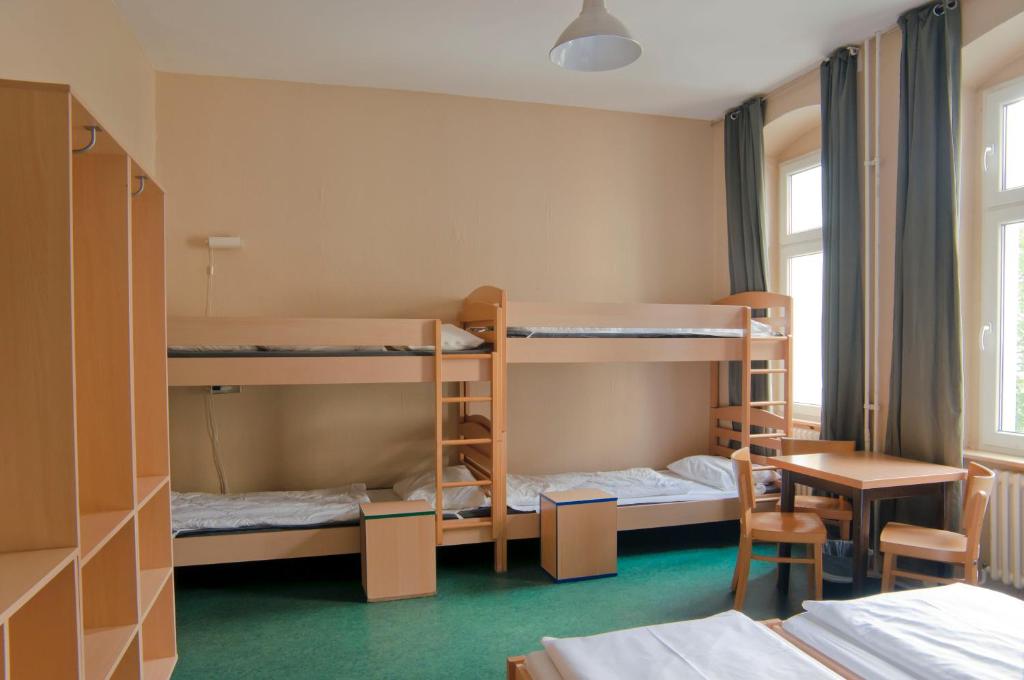 Postel nebo postele na pokoji v ubytování Happy Hotel Berlin