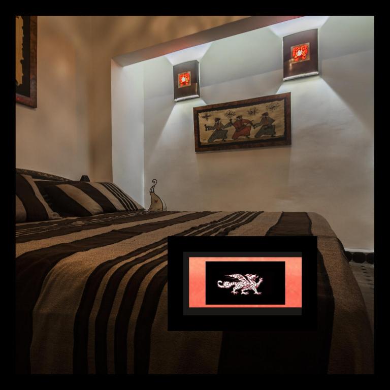 Postel nebo postele na pokoji v ubytování Riad Bab Essaouira
